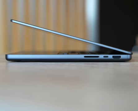The SD card slot, USB-C and HDMI ports of the MacBook Pro.