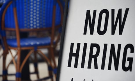 A restaurant displays a sign advertising for job applicants amid the coronavirus pandemic. 