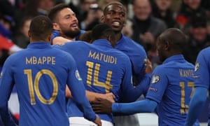 Olivier Giroud is congratulated during France’s win against Iceland.
