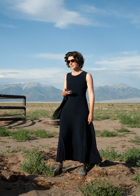 Marguerite Humeau on a hillside.