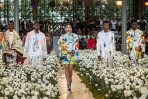 Gigi Hadid presents a creation from the spring/ summer 2020 Off-White men’s collection by the designer at Paris fashion week