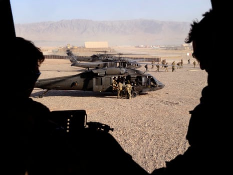 Special Operations Task Group soldiers land in a Black Hawk helicopter at Tarin Kowt, Oruzgan, in June 2010