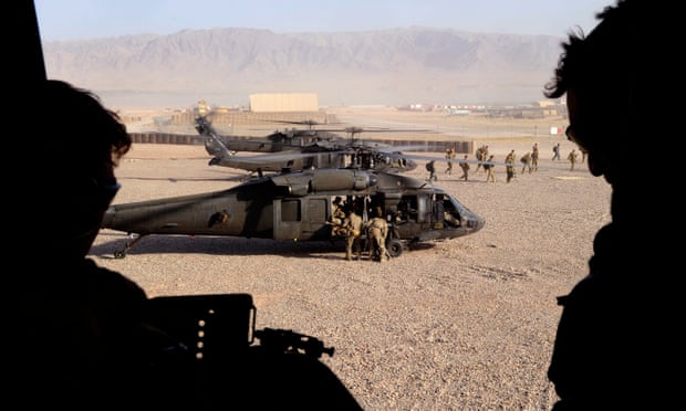 Australian soldiers land in a Black Hawk helicopter at Tarin Kowt, Afghanistan