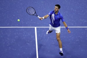 Novak Djokovic returns a volley.
