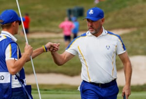 Team Europe’s Lee Westwood reacts on the first green after winning the hole.