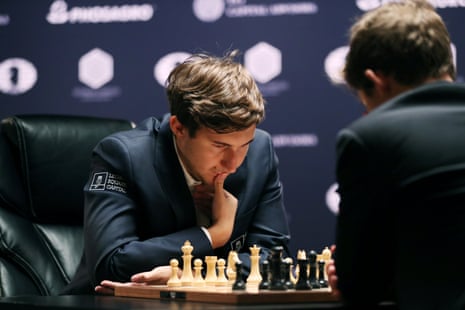 Norway's Magnus Carlsen retains World Chess Championship after tie-breaker