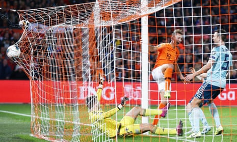 Luuk de Jong of Netherlands scores his sides second goal.