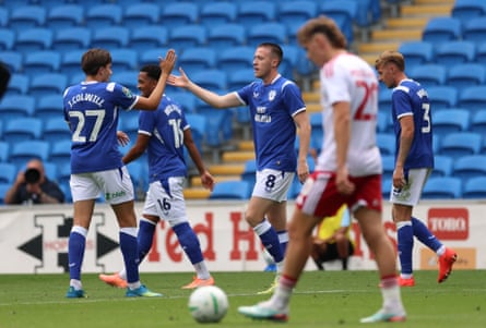 Cardiff’s Jack Moylan celebrates with Joel Colwill after scoring their third against Swindon.