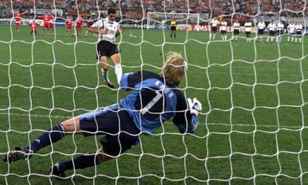 Mauricio Pellegrino, playing for Valencia, has his penalty saved by Oliver Kahn in the shootout of the 2001 Champions League final to give Bayern Munich the title.