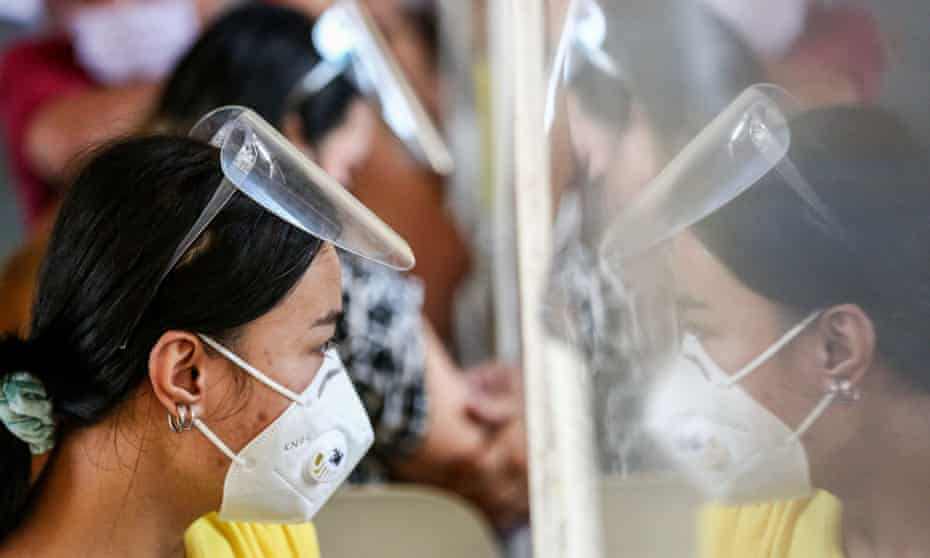 Patients queue to receive Covid-19 vaccines in Quezon City, Metro Manila, Philippines.