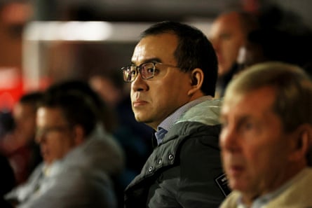 Jeff Shi, Wolves executive chairman, looks on during the midweek Premier League 2 match between Wolves and Leeds United in Kidderminster.