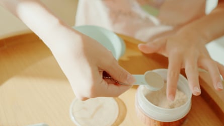 Young girl’s hands beginning a facial routine.