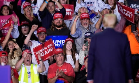 The crowd cheers as Donald Trump arrives to speak at a campaign rally in Grand Rapids, Michigan.