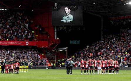 Players, officials and fans take part in a minutes silence in memory of Maddy Cusack before the Premier League match between Sheffield United and Newcastle.