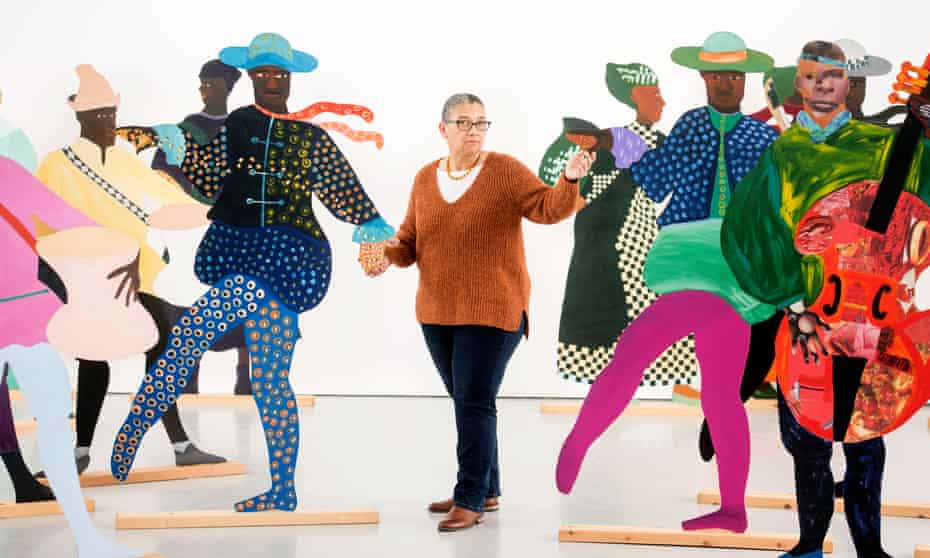 Lubaina Himid with her signature cut-out artworks, representing African slaves in 18th-century royal European courts.