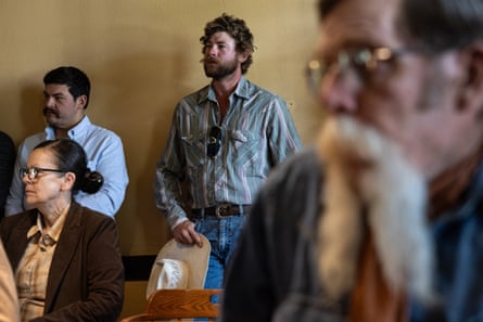 People attend a local hearing