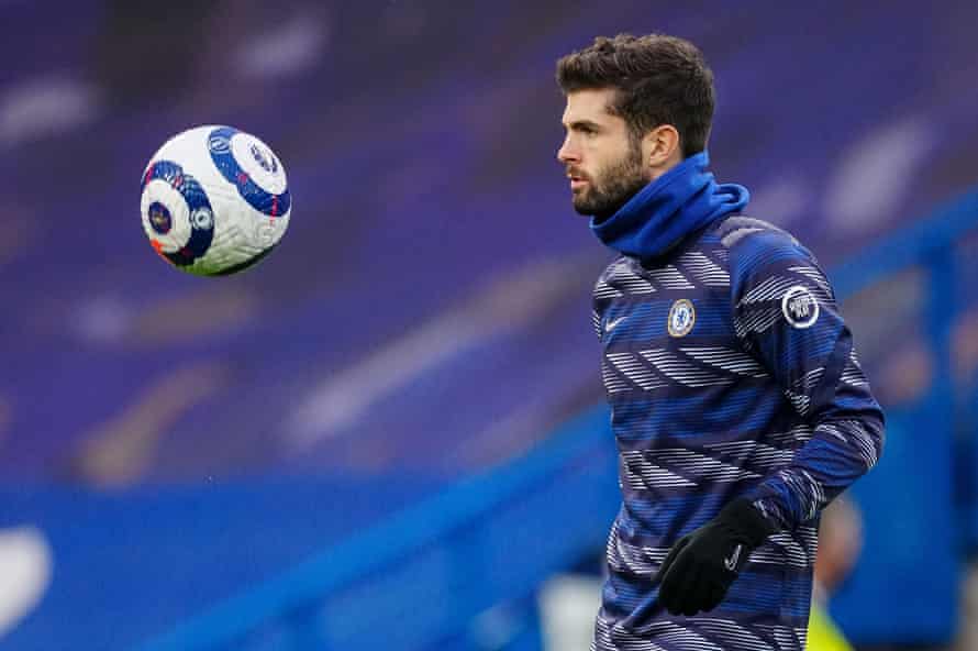 Christian Pulisic warms up at Stamford Bridge.