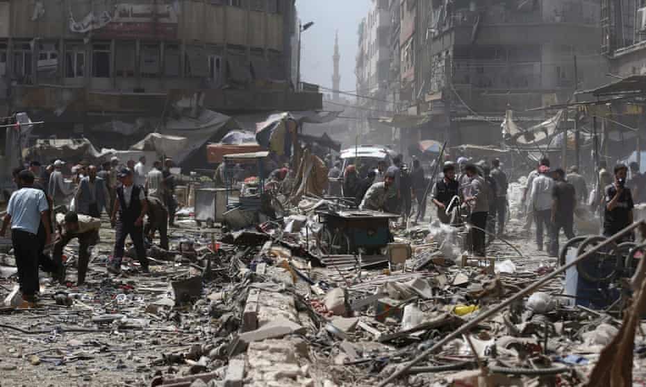 Douma marketplace after being hit in an Assad regime airstrike on Saturday. 