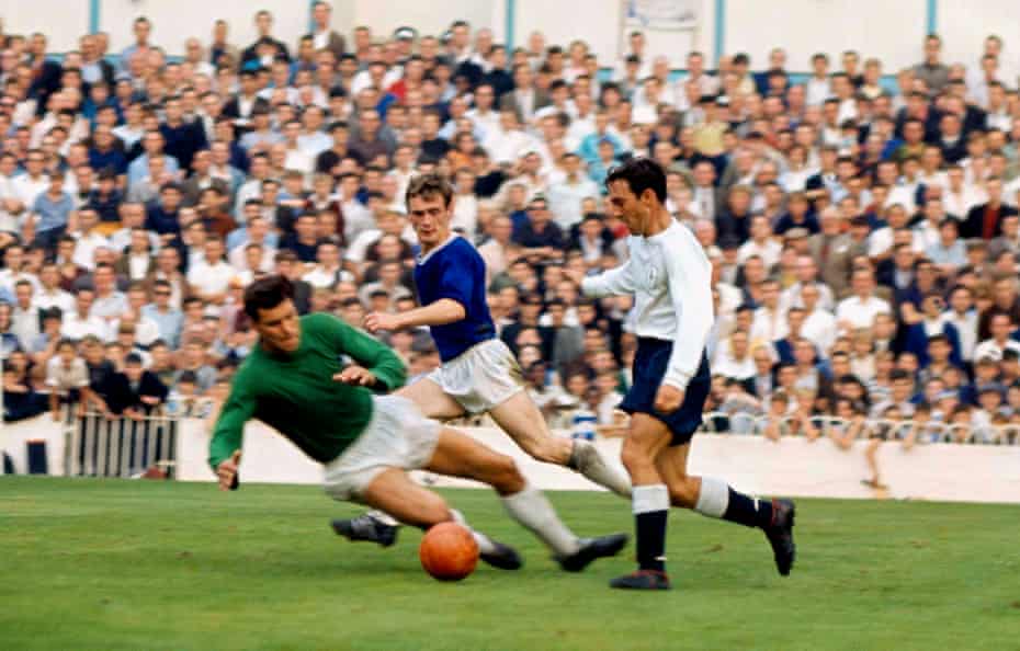 Tottenham Hotspurs’ Jimmy Greaves rounds Birmingham City goalkeeper Colin Withers at White Hart Lane in September 1964.