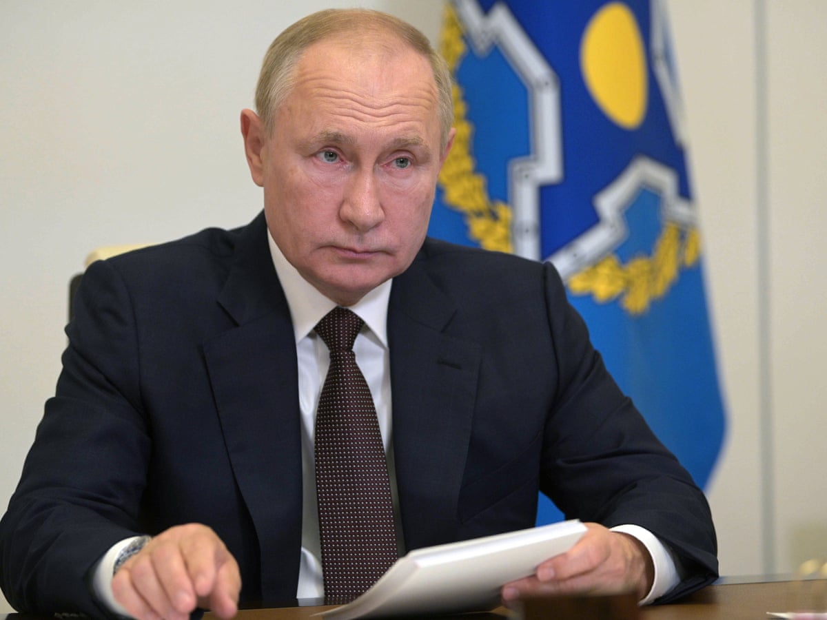 Vladimir Putin says dozens in Kremlin inner circle have Covid | Russia |  The Guardian