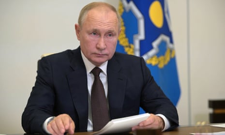 Vladimir Putin attends the CSTO summit via videoconference