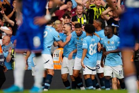 Mateo Kovacic celebrates with his teammates after making it 2-0 to City