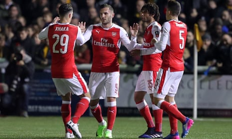 Lucas Pérez (second left) celebrates giving Arsenal the lead in the FA Cup fifth round against Sutton United at Gander Green Lane
