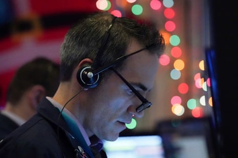 A trader works at the New York Stock Exchange, where stocks have surged this year