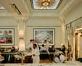 Waiting staff and diners inside Dante Mayfair at Claridge's.
