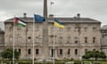 The flag of Palestine (left) flying outside Leinster House, Dublin, 28 May 2024