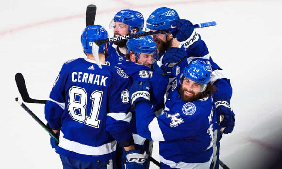 Tampa Bay Lightning left wing Pat Maroon (14) celebrates with teammates after scoring against the Colorado Avalanche