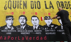Bogota, Colombia. 30th Sep, 2020. A man takes part in the elaboration of a mural on the false positives, in Bogota, Colombia, 30 September 2020. NGOs of victims of extrajudicial executions, known in Colombia as false positives, took part this Wednesday in the elaboration of a mural with the faces of several Colombian military commanders, that reads Who gave the Order?. Credit: EFE News Agency/Alamy Live News<br>2CX1BJE Bogota, Colombia. 30th Sep, 2020. A man takes part in the elaboration of a mural on the false positives, in Bogota, Colombia, 30 September 2020. NGOs of victims of extrajudicial executions, known in Colombia as false positives, took part this Wednesday in the elaboration of a mural with the faces of several Colombian military commanders, that reads Who gave the Order?. Credit: EFE News Agency/Alamy Live News