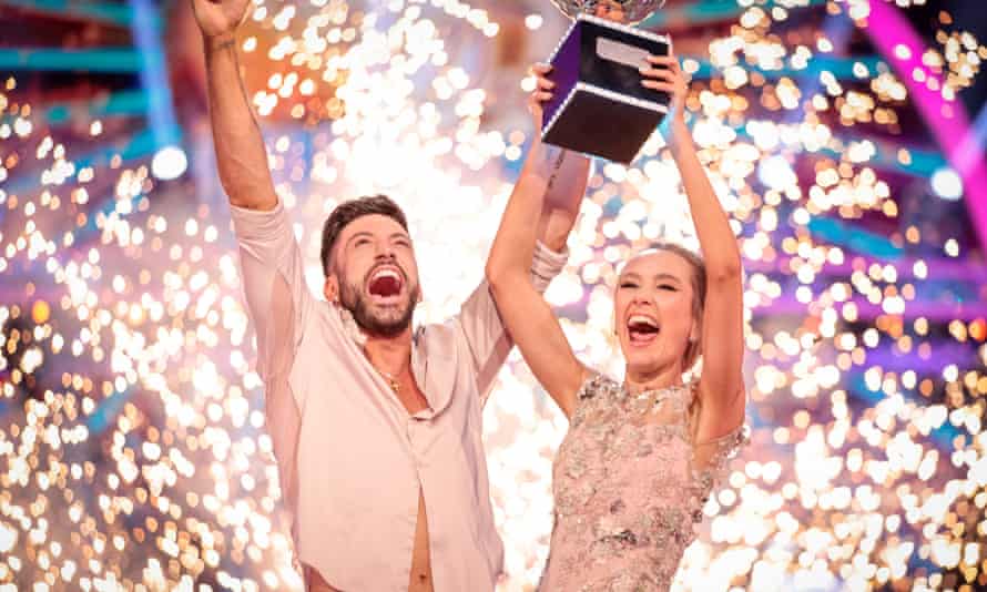 Rose Ayling-Ellis and Giovanni Pernice lifting the Strictly trophy on Saturday 21 December.