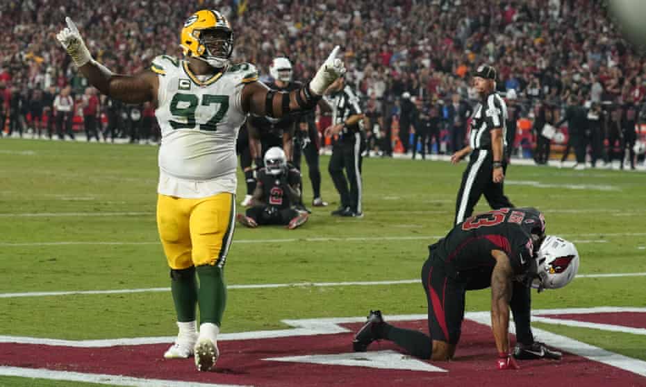 Green Bay Packers nose tackle Kenny Clark (97) celebrates after a turnover against the Arizona Cardinals