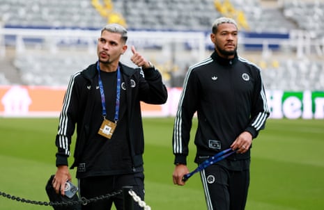 Newcastle’s Brazilian midfielders Bruno Guimaraes (left) and Joelinton make their way to the home dressing room.