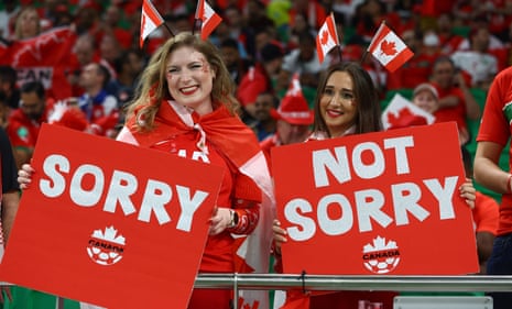 Canada fan display signs inside the stadium before the match.