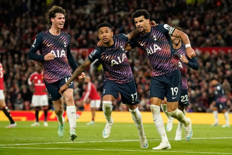 Dominic Solanke (right) celebrates with Savio (centre) and Archie Gray after scoring Tottenham's late equaliser at Manchester United