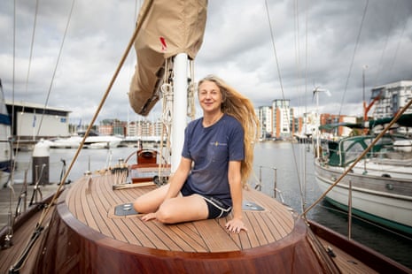 Sacha Walker sitting on a racing yacht