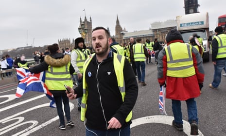 James Goddard (centre) with other yellow vest protesters on Westminster Bridge