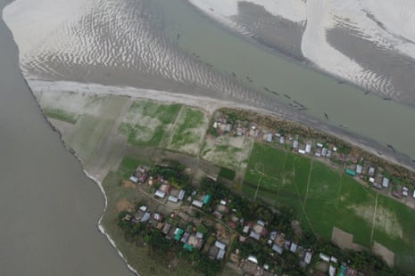 This drone view show one of the Char islands gradually vanishing into the Brahmaputra River because of erosion.