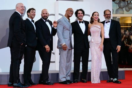 Hiram Garcia, David Koplan, Mark Kerr, Dwayne Johnson, Benny Safdie, Emily Blunt and Andrea Romeo attend the red carpet of the movie The Smashing Machine at the Venice Film Festival in September.