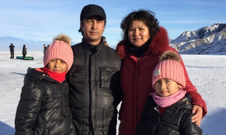 Tahir Hamut Izgil (back left) and his family in 2015.