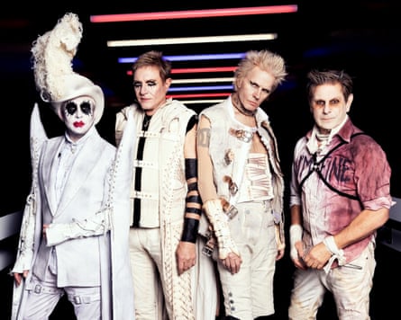 The four members of Duran Duran in white Halloween costumes.
