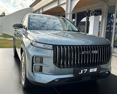 Front view of a pretty ugly silver car