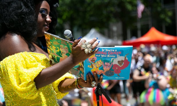 A drag queen holds a ‘Drag Queen Story Hour’ on 25 June, in Raleigh, North Carolina. The events have become a main target for rightwing ire.