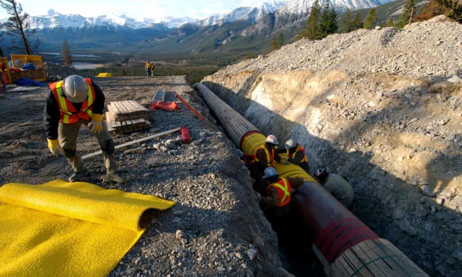 Workers construct the Anchor Loop section of Kinder Morgan’s Trans Mountain pipeline expansion in Jasper national park in a 2009 file photo