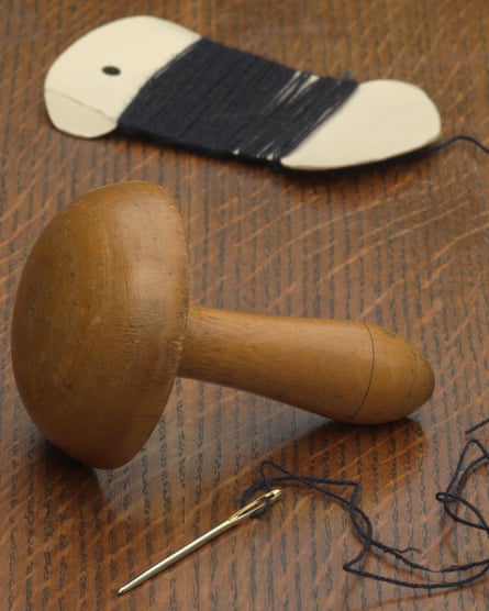 Getting the right tools – like this darning mushroom, and a needle and thread – will set you up for success.
