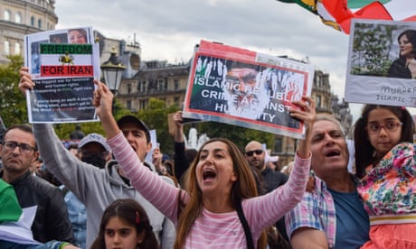 Protesters waving signs
