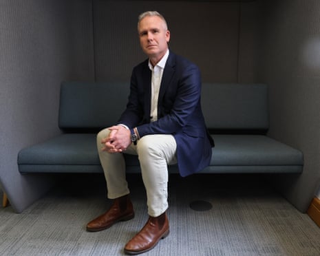 George Williamson, Alan Turing Institute CEO, sits forward on a sofa with hands clasped