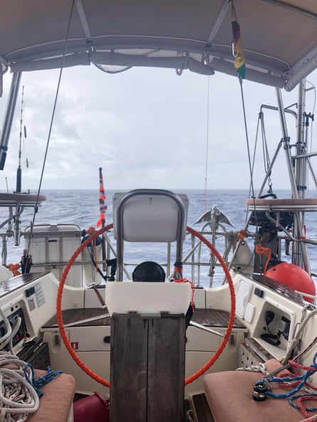 A picture of the boat looking past its bright orange wheel